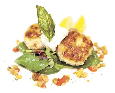 Seasons of Coeur d'Alene's Crabby Cakes. The $9 entree features blue crab with sweet corn jalapeno relish, tartar and a fried basil leaf garnish. (Christian Wilson)