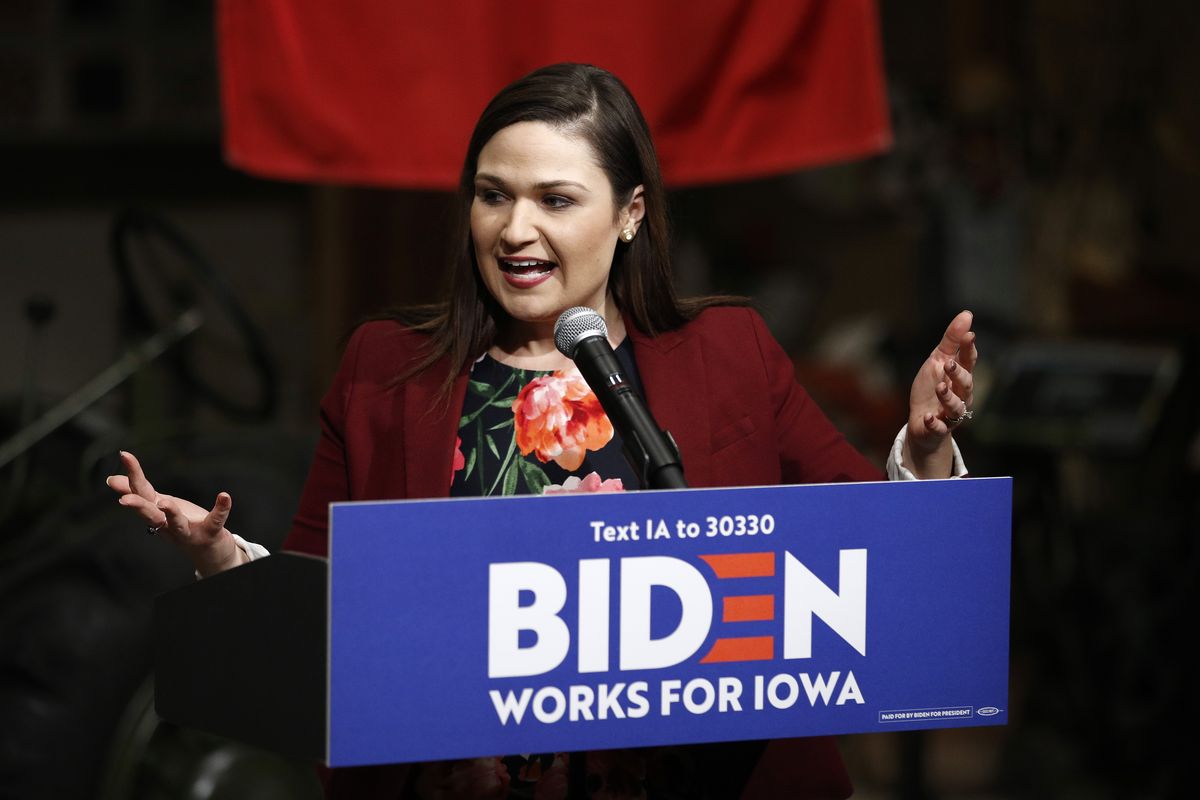 FILE - In this Jan. 3, 2020 file photo, Rep. Abby Finkenauer, D-Iowa, introduces Democratic presidential candidate, former Vice President Joe Biden during a campaign event in Independence, Iowa. President-elect Joe Biden is eyeing several Democrats who lost congressional reelection races last month for key positions in his administration. They include outgoing Reps. Abby Finkenauer of Iowa and Donna Shalala of Florida and Sen. Doug Jones of Alabama. (Patrick Semansky)