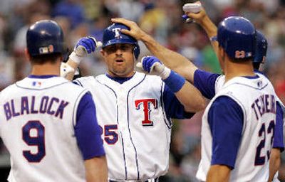 
The Cubs hope Phil Nevin, center, can provide offense until Derrek Lee returns. 
 (Associated Press / The Spokesman-Review)