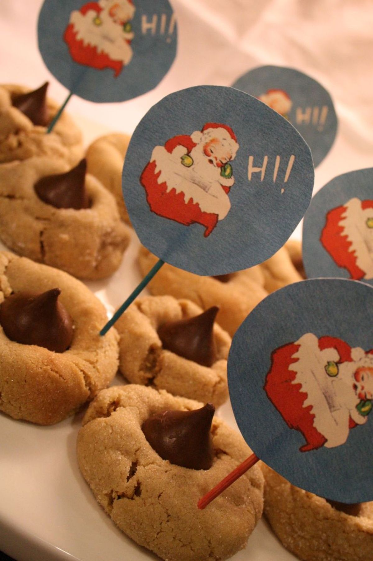 Use images from vintage Christmas cards to make cupcake or cookie toppers. (Megan Cooley)