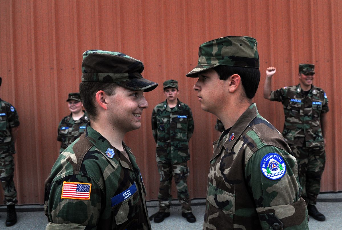 Alpha Flight Commander Stephen Hess, 17, tries to get Airman David Repsold, 15, to crack a smile during a training exercise for the Civil Air Patrol at Felts Field in Spokane. The Civil Air Patrol teaches youth leadership, responsibility and military customs. (Rajah Bose / The Spokesman-Review)
