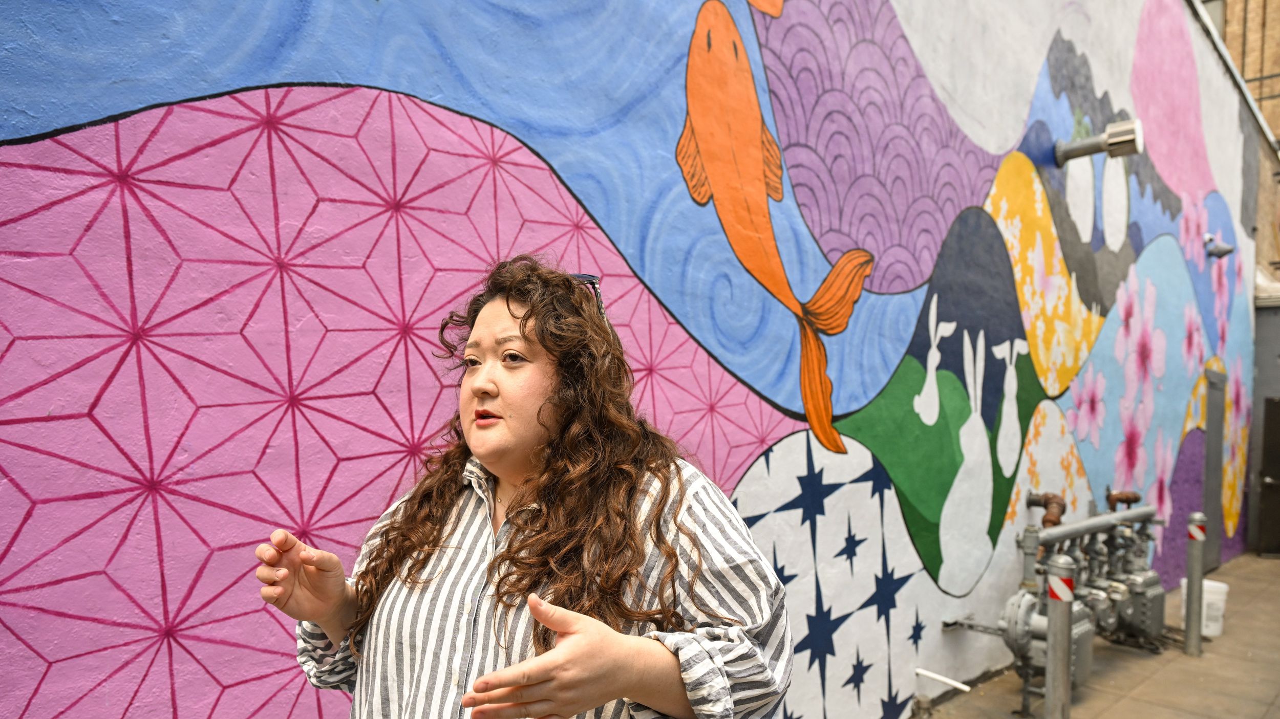 Artist Lisa Soranaka paints mural that honors Chinese, Japanese