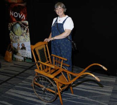 
Fleeta Holcomb stands beside the antique child's wheelchair she took to the Antiques Roadshow in Spokane last August.Courtesy of Fleeta Holcomb
 (Courtesy of Fleeta Holcomb / The Spokesman-Review)