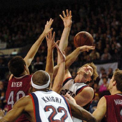 
Sean Mallon attempts to rebound his own shot in the second half of the WCC Men's Final game against Loyola Marymount University. The Zags came back from a 15 point deficit to beat the LMU Lions 68-67. 
 (Kathryn Stevens / The Spokesman-Review)