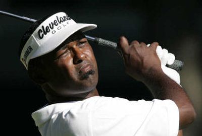 
Vijay Singh watches his drive on the 18th hole during the final round of the Buick Open on Sunday.
 (Associated Press / The Spokesman-Review)