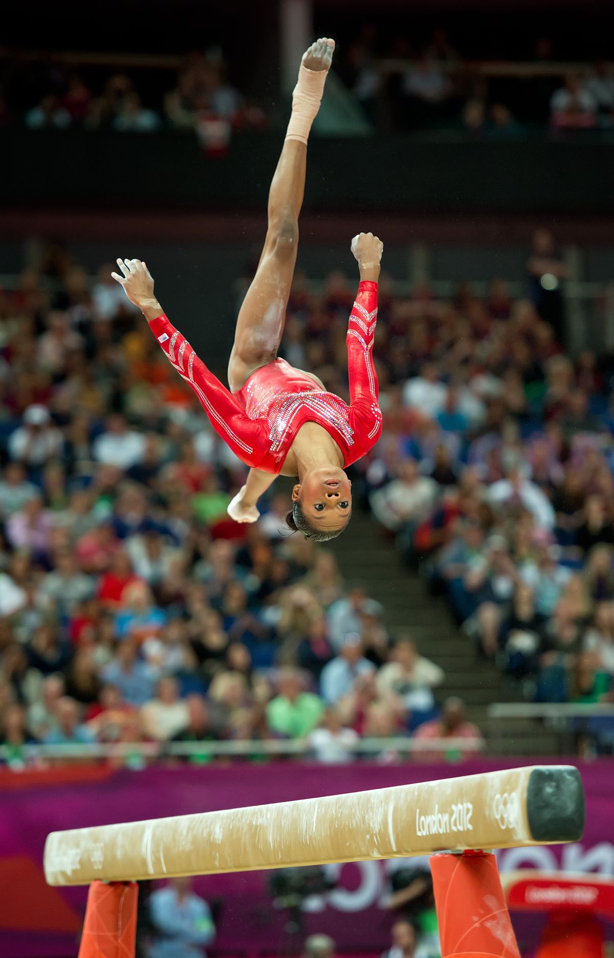 Gabrielle Douglas performs on the balance beam for the United States’ gold medal-winning team.