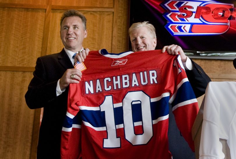 Spokane Chiefs General Manager Tim Speltz, on right, introduces Don Nachbaur as the new head coach of the Spokane Chiefs, Wednesday, June 30, 2010. at the Spokane Arena.  (Colin Mulvany / The Spokesman-Review)