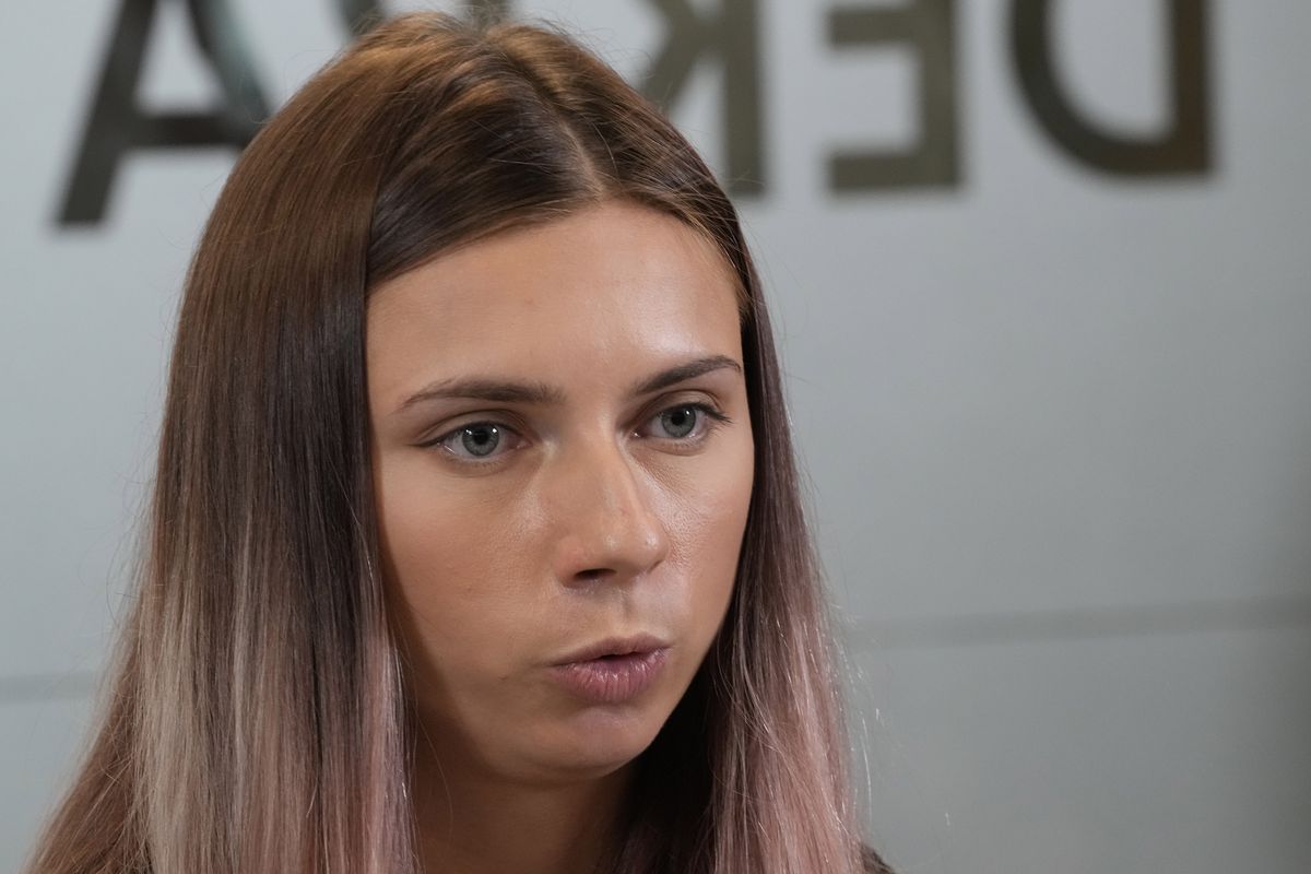 Belarusian Olympic sprinter Krystsina Tsimanouskaya, who came to Poland fearing reprisals at home after criticizing her coaches at the Tokyo Games, talks to reporters in Warsaw, Poland, Thursday, Aug. 5, 2021.  (Czarek Sokolowski)