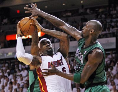 Miami’s LeBron James scored 34 points against the Boston Celtics’ pressure defense. (Associated Press)