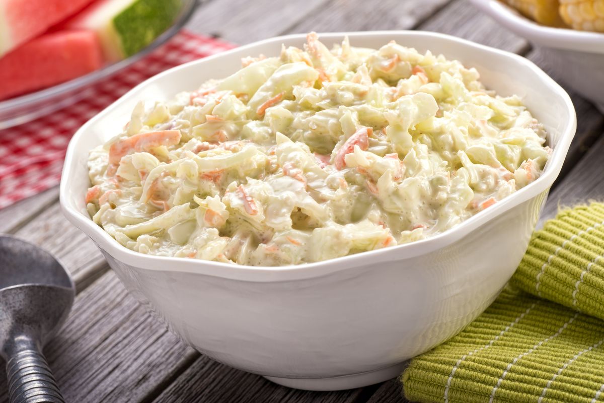 A bowl of delicious creamy homemade coleslaw is a perfect addition to an outdoor picnic.  (Getty Images)
