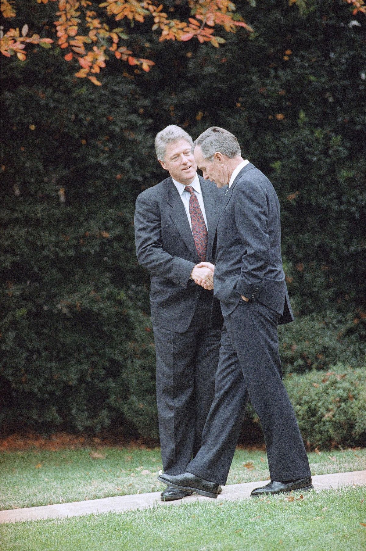 President George H.W. Bush shakes hands with President-elect Bill Clinton after an Oval Office meeting Nov. 18, 1992, in Washington. (Greg Gibson / Associated Press)
