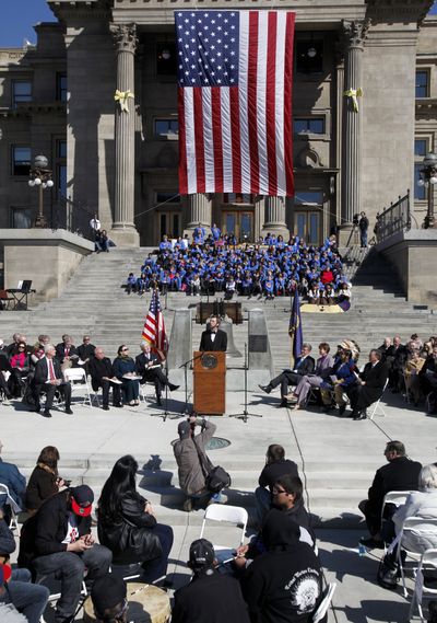Abraham Lincoln portrayer Steve Holgate delivers an address during Idaho’s Territorial Sesquicentennial celebration at the Idaho Statehouse in Boise on Monday. (Associated Press)