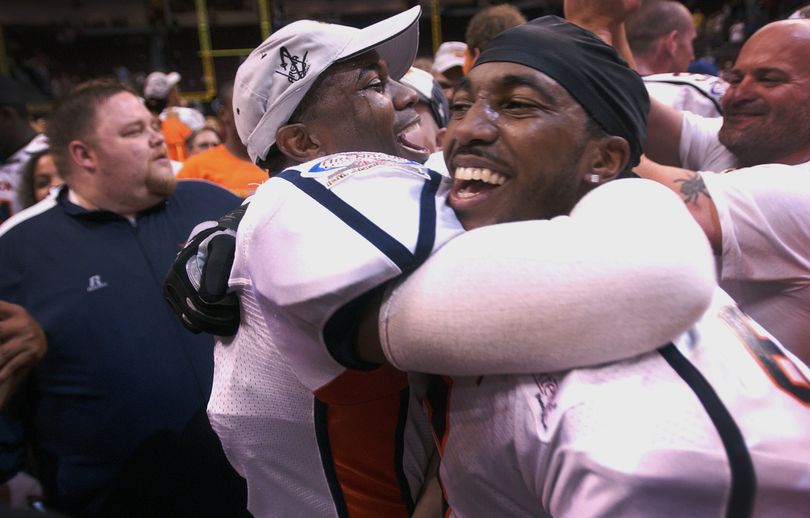 Aaron Williams, left, and Stanley Franks of the Shock celebrate Spokane’s second af2 championship in four seasons. Special to  (David Becker photos Special to / The Spokesman-Review)