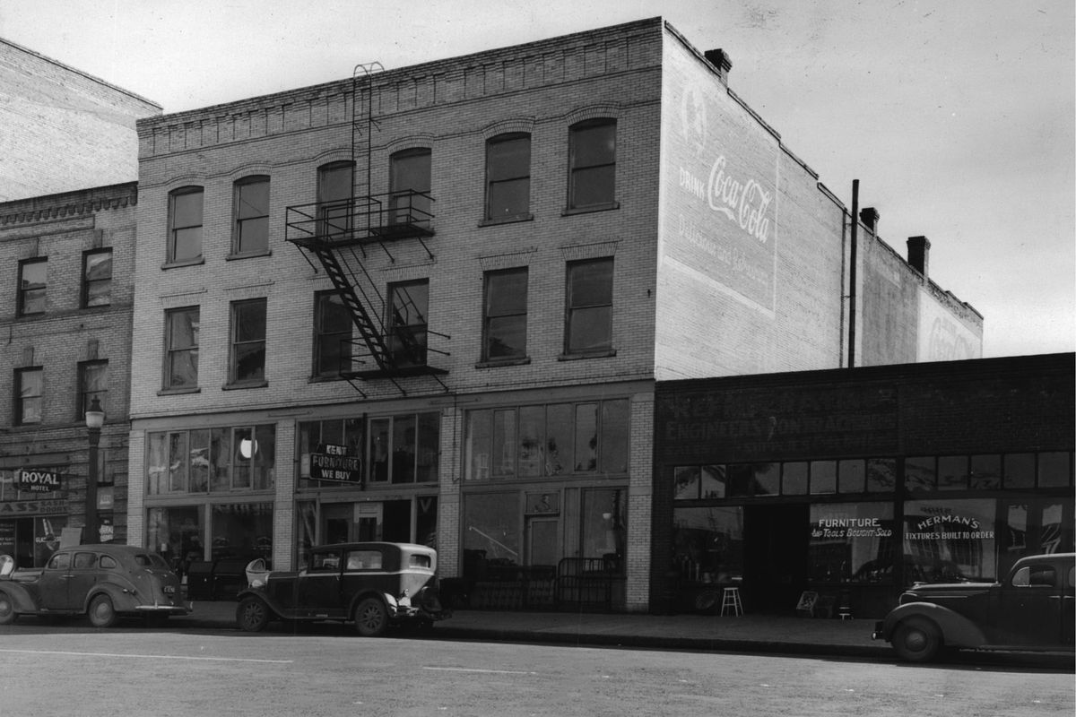 1941 – Kent Furniture Store, located at W. 35 Mai Ave., operated for a decade or so selling new and used furniture out of the 1908 building. This block was home to mostly second-hand stores, repair shops and manufacturing in plain buildings until the modern era. (Jesse Tinsley / The Spokesman-Review)