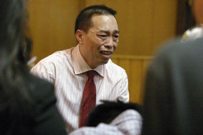 
Chai Soua Vang testifies at his murder trial Thursday in Hayward, Wis. Vang is charged with six counts of first-degree murder and three counts of attempted murder in the Nov. 21, 2004, shootings in isolated woods in Wisconsin.
 (Associated Press / The Spokesman-Review)