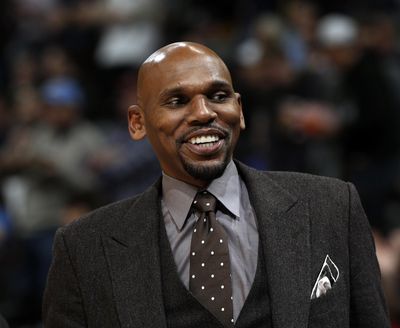 In this Dec. 10, 2018, file photo, Memphis Grizzlies assistant coach Jerry Stackhouse smiles during the first half of an NBA basketball game against the Denver Nuggets, in Denver. A person familiar with the situation says Vanderbilt has hired Memphis Grizzlies assistant and former NBA All-Star Jerry Stackhouse as its basketball coach. The person spoke on the condition of anonymity Friday, April 5, 2019, because Vanderbilt has not commented on its coaching search. (David Zalubowski / Associated Press)