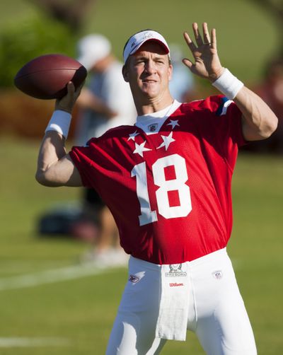 Indianapolis Colts quarterback Peyton Manning throws a pass during an AFC practice before today’s Pro Bowl in Honolulu.  (Associated Press)