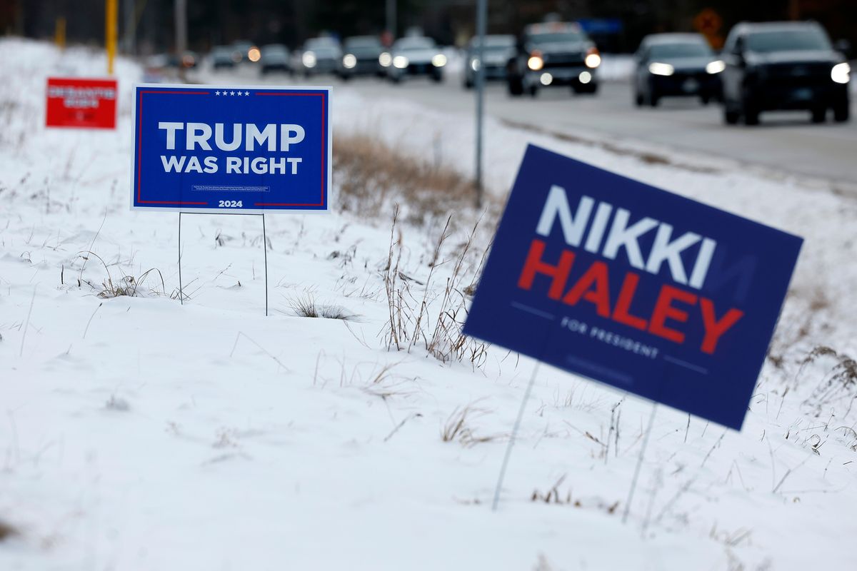 Campaign signs for Republican presidential candidates former President Donald Trump and former U.N. Ambassador Nikki Haley stand along a road ahead of Tuesday’s primary election in Loudon, N.H.  (Chip Somodevilla)