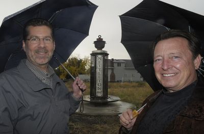 Kevin Bownlee, left, and artist Steffan Wachholtz check on the progress of the Nettleton neighborhood monument Friday.   (CHRISTOPHER ANDERSON / The Spokesman-Review)