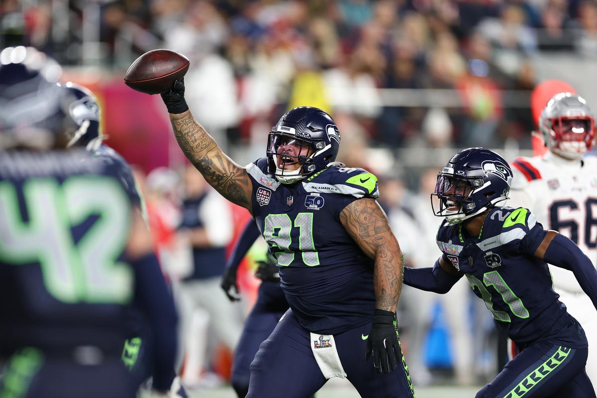 Seahawks defensive tackle Byron Murphy II recovers a fumble against the Patriots during Super Bowl 60 on Feb. 8 at Levi’s Stadium in Santa Clara, Calif.  (Getty Images)
