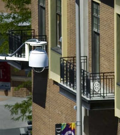 
A surveillance camera peers over the edge of the Post Office building at Riverside and Lincoln. 
 (File / The Spokesman-Review)