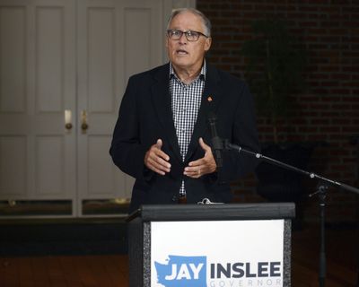 Gov. Jay Inslee thanks the voters of Washington state after winning his third term, Tuesday, Nov. 3, 2020 in Olympia Wash.   (Steve Bloom/The Olympian via Associated Press)