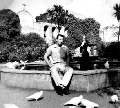 
A young Louis St. Louis sits by the fountain at the San Juan Capistrano mission sometime between 1950 and 1952. 
 (The Spokesman-Review)