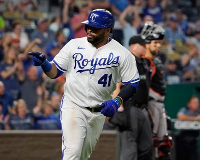 Carlos Santana of the Kansas City Royals points to teammates after hitting a two-run home run against the Baltimore Orioles in the fifth inning at Kauffman Stadium on Thursday, June 9, 2022, in Kansas City, Missouri.  (Tribune News Service)