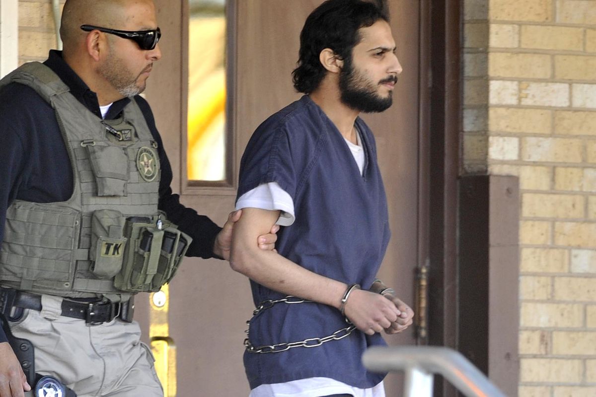Khalid Ali-Aldawsari, 22, right, is escorted from the federal courthouse in Amarillo, Texas by U.S. Marshals Tuesday Nov. 13, 2012 after being sentenced to life in prison on a federal charge of attempting to use a weapon of mass destruction in a Lubbock-based bomb-making plot. (Michael Schumacher / Amarillo Globe-news)