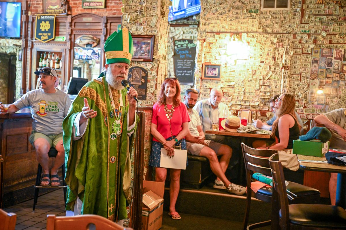 Tom Keefe, attired in his St. Patrick garb he often wears around Spokane, speaks to the members of the Spokane Limerick Sister City Society gathered at O’Doherty’s Irish Grille at the beginning of the annual Limerick Literary Pub Crawl on Tuesday. (Jesse Tinsley/THE SPOKESMAN-REVIEW)