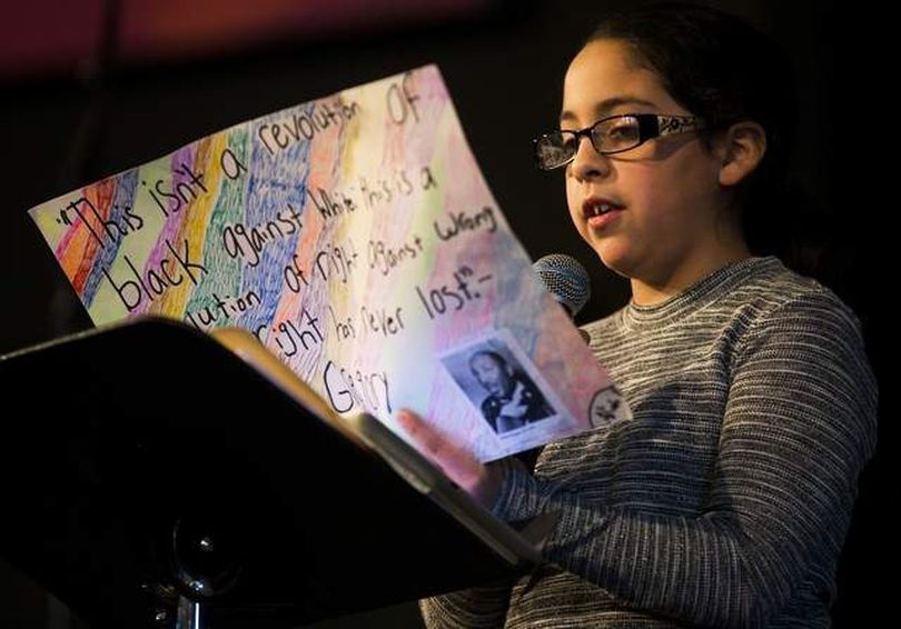West Ridge Elementary student Allah Escamilla shares her civil rights essay before fellow Post Falls School District students at the 32nd annual Dr. Martin Luther King Jr. Kids Program at Lake City Community Church on Thursday. (Loren Benoit/Coeur d'Alene Press photo)