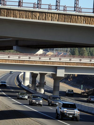 Traffic passes under the North Spokane Corridor on U.S. Highway 2 on Tuesday near Farwell Road, where a new interchange will soon allow cars to move between the new freeway and U.S. 2. (Jesse Tinsley)