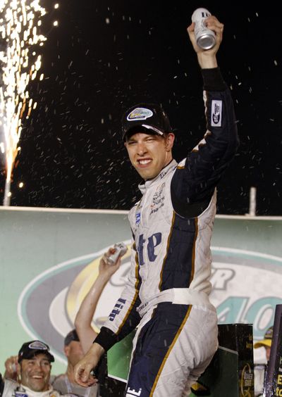 Brad Keselowski should have stuck with the beer after winning Sprint Cup race in Kentucky Saturday night. (Associated Press)