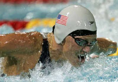 
Jenny Thompson swims the butterfly leg of the U.S. 4x100-meter medley relay on Saturday. 
 (Associated Press / The Spokesman-Review)
