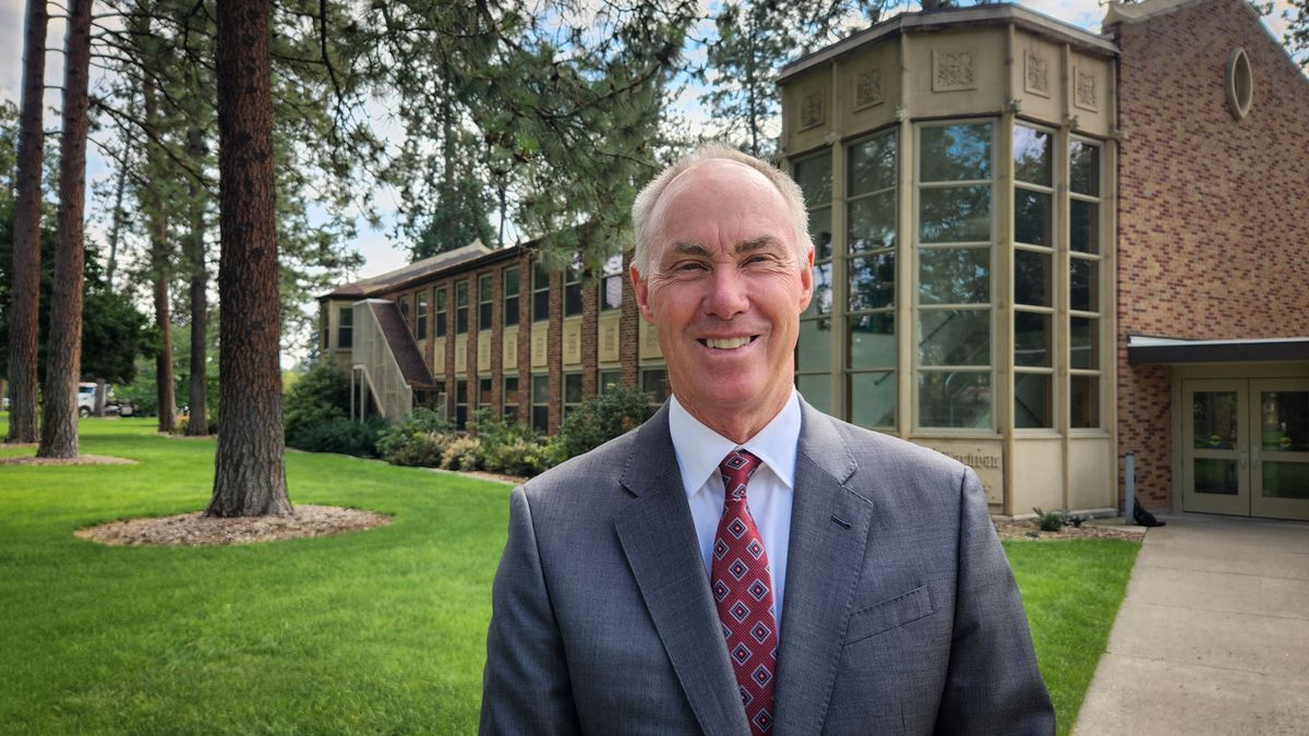 Whitworth University President Scott McQuilkin poses for a photo in front of McEachran Hall. The university is lowering tuition around 50% in a bid to create transparency about costs for prospective students and families.  (Cannon Barnett/The Spokesman-Review)