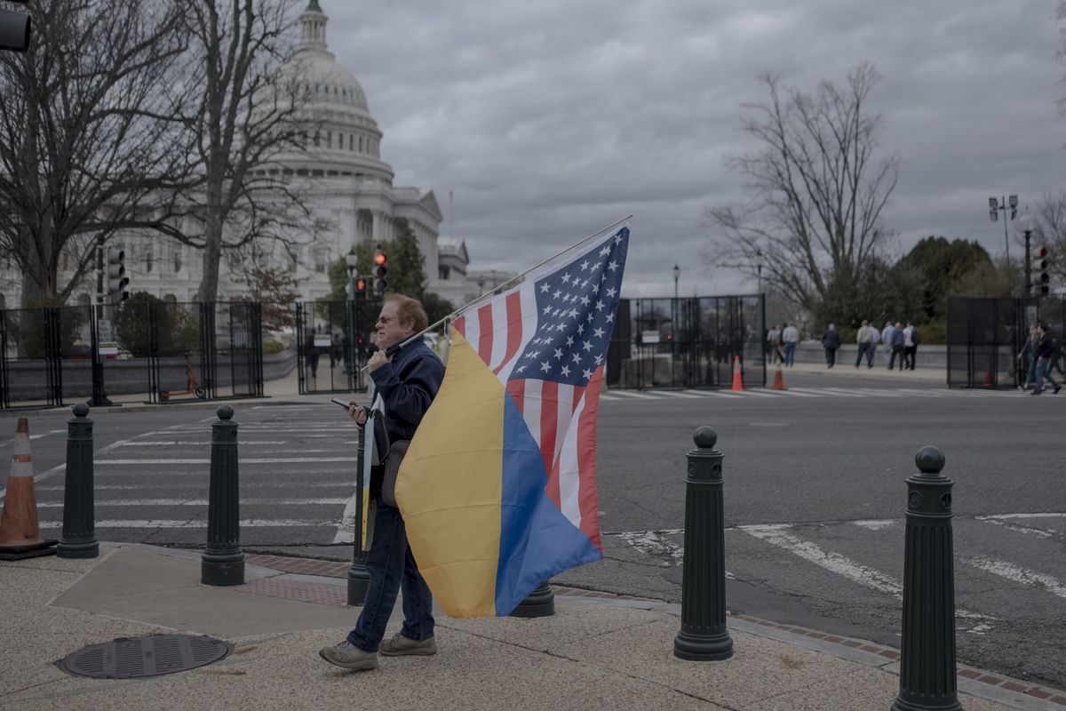 A supporter of Ukraine demonstrates outside the U.S. Capitol on March 7.    (Gabriella Demczuk/For The Washington Post)