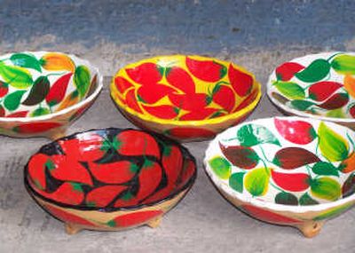 These bowls at Mercado 28 may be mass-produced, but they are distinctively painted by hand.
 (The Spokesman-Review)