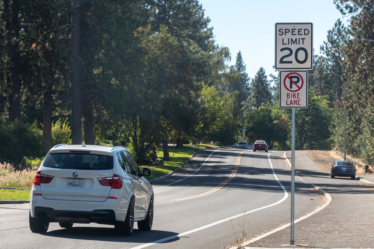 High Drive is pictured Sept. 4, 2020, near 20th Avenue as a police traffic unit waits nearby.  (Jesse Tinsley/The Spokesman-Review)