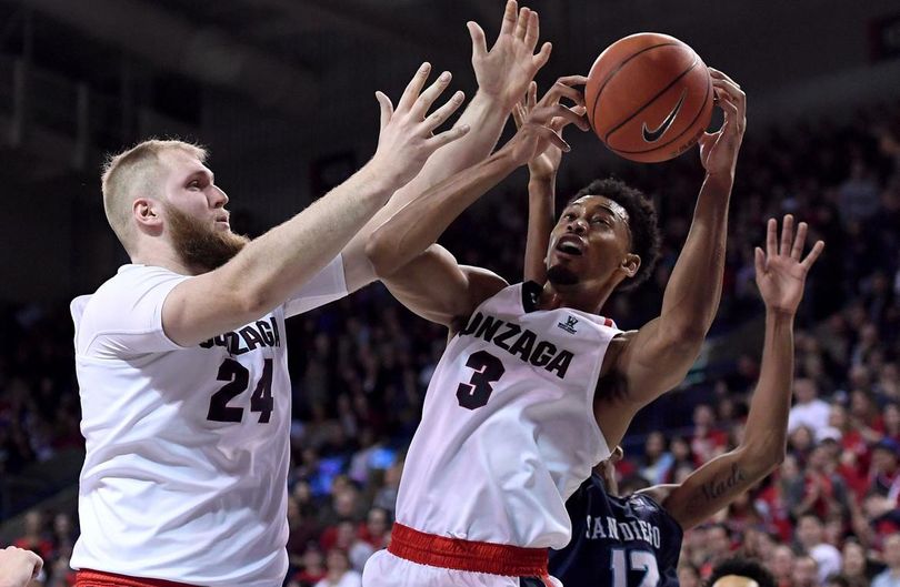 Gonzaga forward Johnathan Williams (3) grabs a rebound with the assist from Gonzaga center Przemek Karnowski (24) during first half of a NCAA college basketball game against San Diego, Thursday, Jan. 26, 2017, in the McCarthey Athletic Center. (Colin Mulvany / The Spokesman-Review)