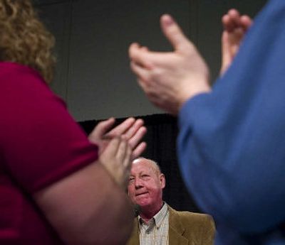 
The applause is for Tom Oswald, honored at the youth awards luncheon at the Spokane Convention Center on Wednesday.
 (Kathryn Stevens / The Spokesman-Review)