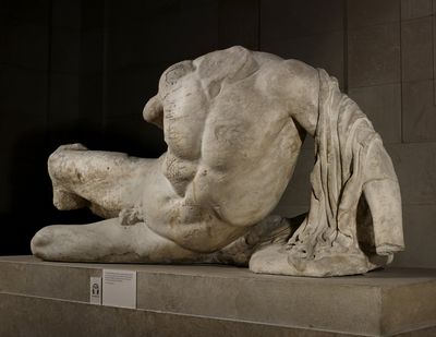 A British Museum photo shows a headless sculpture of the river god Ilissos. The museum has loaned the sculpture to the Hermitage Museum in Russia. (Associated Press)