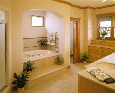 
It may seem daunting to do the sort of thorough cleaning necessary to make your bathroom sparkle like this one. However, once finished, you will be glad you did. Regular cleaning not only makes your bathroom look better, it helps your faucets and toilet work better.
 (Associated Press / The Spokesman-Review)