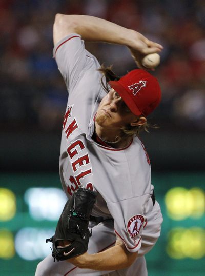 Angels starter Jered Weaver became the first A.L. pitcher to reach 20 wins this season. (Associated Press)