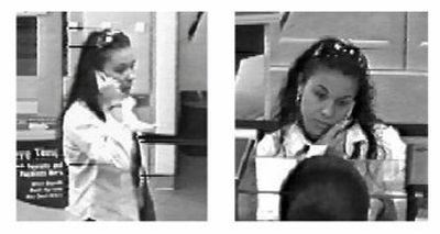 
A video image provided by the Fairfax County, Va., Police Department shows a woman talking on a cell phone while robbing a bank. 
 (Associated Press / The Spokesman-Review)