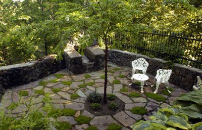 
A lone tree grows in the center of the  garden built by Russ Lundberg and his wife Sara Weaver-Lundberg as a memorial to their daughter Isabelle. 
 (Photos by Dan Pelle/The spokesman-review / The Spokesman-Review)