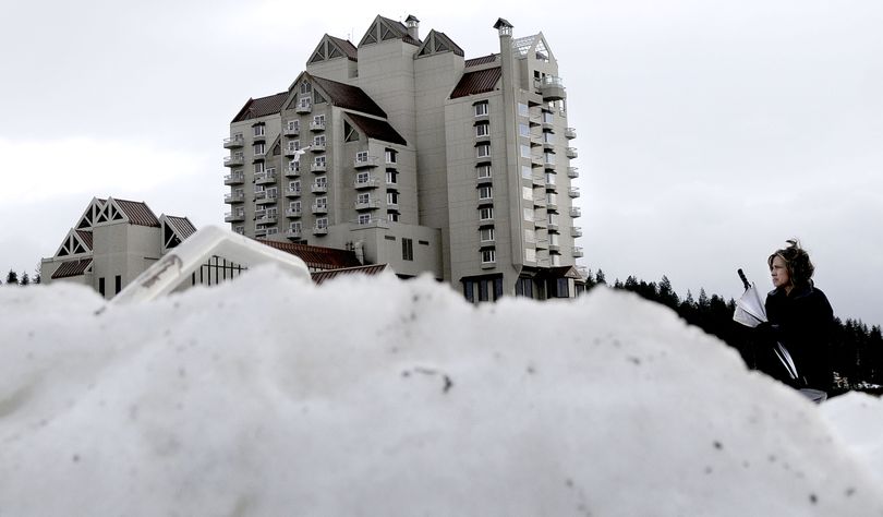 The snow mounds were still high surrounding the Coeur d'Alene Resort on Thursday, January 8, 2009. Hotels say snow days hurt, but the season is typically slow anyway. Hagadone Hospitality has lowered salaries and wages. KATHY PLONKA The Spokesman-Review (Kathy Plonka / The Spokesman-Review)
