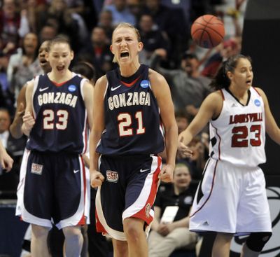 Gonzaga's Courtney Vandersloot (21) roars after being fouled on a jump shot she made in the secondhalf .  The Zags won 76-69 over Louisville, March 25, 2011, in the Spokane Arena. (Dan Pelle / The Spokesman-Review)