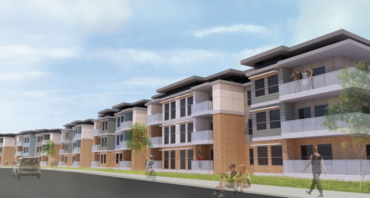 This artist’s rendering shows a three-story apartment building that a private developer plans to build as part of a “village” on the Washington State University campus in Pullman. (Corporate Pointe Developers)