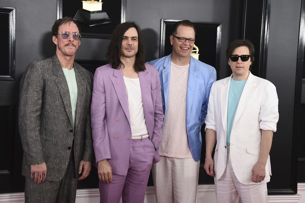 Rivers Cuomo, Brian Bell, Patrick Wilson and Scott Shriner of Weezer arrive at the 61st Annual Grammy Awards at the Staples Center on Feb. 10 in Los Angeles.  (Jordan Strauss/Invision/AP)