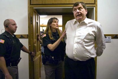 
Spokane businessman Arlin Jordin leaves the courtroom in handcuffs after being convicted of second-degree rape and indecent liberties  Thursday morning. 
 (Holly Pickett / The Spokesman-Review)